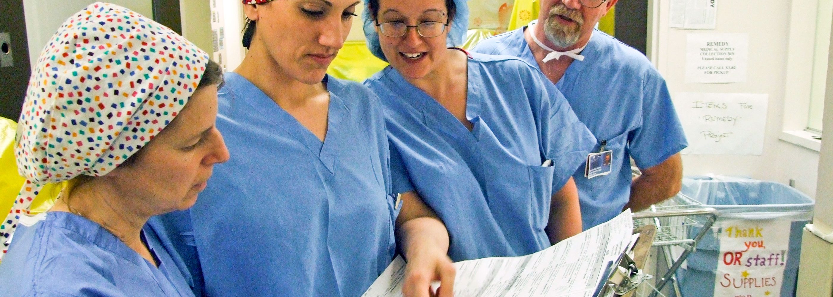 UConn Neonatal Nursing Online Master's Degree: Nurses working together in Neonatal unit.